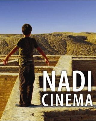 Child standing with Nadi Cinema text on image