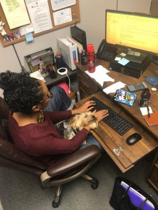 Brittany Hearne typing at her desk