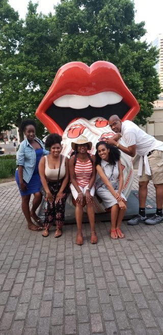 Brittany Hearne and friends in front of big lips